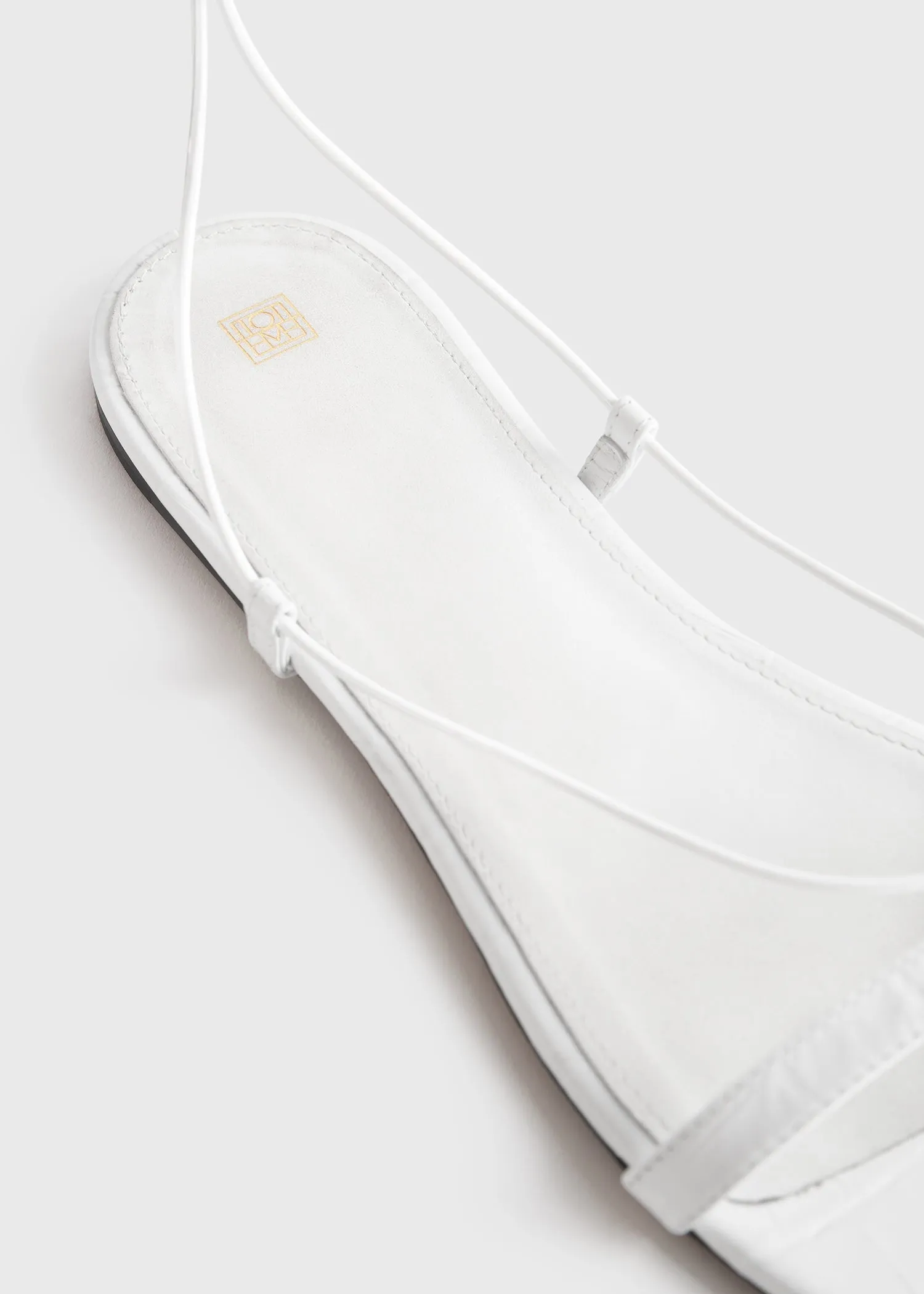 The Croco Tie Sandal white